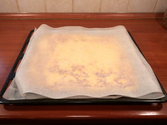 Covering the Baked Zucchini Sheet Before Flipping